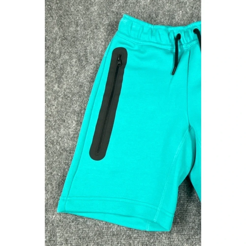 Nike Tech Kids Small Teal Green Fleece Drawstring Shorts Zip Pocket NWT